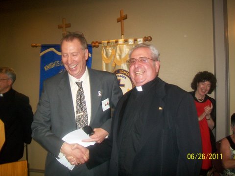 Monsignor Pizzacalla wins dinner for two!